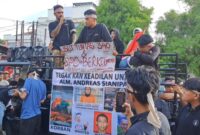 Foto: Aksi Damai Keluarga Korban Pembunuhan di Polrestabes Medan. (Dok-Istimewa).