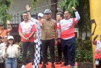 Drs.Arifin Wali Kota Jakpus melepas 1.250 peserta Fun Bike Siwo PWI Jaya 2025