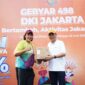 Berbagai hadiah menarik diberikan langsung bagi para pengunjung yang memanfaat promo tambah daya PLN diskon 50% Gebyar 498 DKI Jakarta di Car Free Day Depan Plaza Asia, Jakarta (22/06/25).