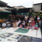 Foto: Forum Betawi Rempug (FBR) Gardu Ranjau Barat G.0361 menggelar kegiatan santunan untuk 60 anak yatim di Jalan Patra Raya, Kelurahan Duri Kepa, Kecamatan Kebon Jeruk, Minggu (26/10/2025).