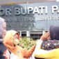 Foto: Warga Pati gelar aksi di depan kantor Bupati Pati. (Dok-Liputan6.com/Arief Pramono)