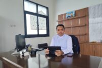 Foto: Rektor Universitas Dharma Indonesia (UNDHI) Agus Prihartono PS berada di ruang kerjanya di Kampus UNDHI, Cikupa, Kabupaten Tangerang, Banten.