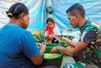 Foto: Para mama-mama Papua yang mengambil peran penting di dapur umum guna mendukung operasional Satgas TMMD, Sabtu (25/4/2026). (Dok-Istimewa)