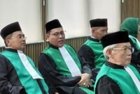 Foto: Sejumlah hakim tinggi dan pejabat peradilan agama mengenakan toga hijau khas peradilan agama saat menghadiri prosesi pelantikan dan pengambilan sumpah jabatan di lingkungan Pengadilan Tinggi Agama (PTA) Jakarta, Rabu (20/5/2026).