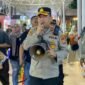 Foto: Komisaris Polisi Agung Ardiansyah, Kapolsek Kemayoran saat memberikan Imbauan kepada para pengunjung PRJ Kemayoran. (Dok-Istimewa)