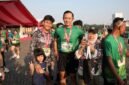 Menteri Koordinator Bidang Infrastruktur dan Pembangunan Kewilayahan Agus Harimurti Yudhoyono (AHY) mengikuti kategori lari 10 kilometer dalam ajang Kostrad Run 2026 yang digelar di kawasan Monumen Nasional (Monas), Jakarta, Senin (6/7).