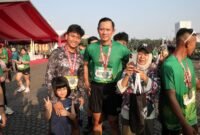 Menteri Koordinator Bidang Infrastruktur dan Pembangunan Kewilayahan Agus Harimurti Yudhoyono (AHY) mengikuti kategori lari 10 kilometer dalam ajang Kostrad Run 2026 yang digelar di kawasan Monumen Nasional (Monas), Jakarta, Senin (6/7).
