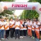 Foto: Wali Kota Administrasi Jakarta Pusat Arifin bersama Wakil Wali Kota Administrasi Jakarta Pusat Eric PZ Lumbun, Sekertaris Kota Administrasi Jakarta Pusat Denny Ramdani berfoto bersama jajaran ASN dan pegawai usai mengikuti Fun Walk Wali Kota Jakarta Pusat 2026, Minggu (12/7/2026).