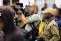 Direktorat Jenderal Imigrasi mengamankan seorang warga negara Rusia berinisial AP (39) setelah kedapatan merekam aksi demonstrasi Komite Nasional Papua Barat (KNPB) di Wamena, Papua Pegunungan.