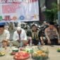 Foto: Suasana penuh khidmat mewarnai malam tasyakuran HUT ke-81 Kemerdekaan Republik Indonesia di lingkungan RW 08 Kelurahan Duri Utara, Kecamatan Tambora, Jakarta Barat, Minggu malam (16/8/2026).