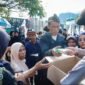 Foto: Pelayanan Humanis, Polisi Berbagi Roti dan Air di Tengah Aksi Unjuk Rasa (UNRAS) di kawasan gedung DPR/MPR RI, Senin (21/9/2026). (Istimewa)