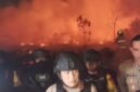 Foto: Kapolres Metro Jakarta Barat Kombes Nasriadi dan personel Brimob berada di lokasi kebakaran yang melanda area lapak di kawasan Kampung Ambon, Cengkareng, Jakarta Barat, Rabu (14/10/2026) malam.